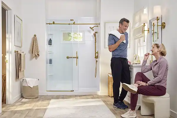 Man and woman in remodeled bathroom